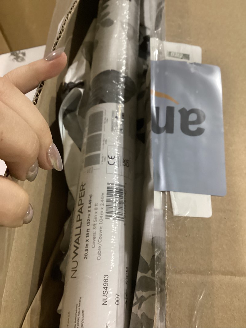 Condition photo showing Good Condition for NuWallpaper Black Breezy Peel & Stick Wallpaper, NUS4983