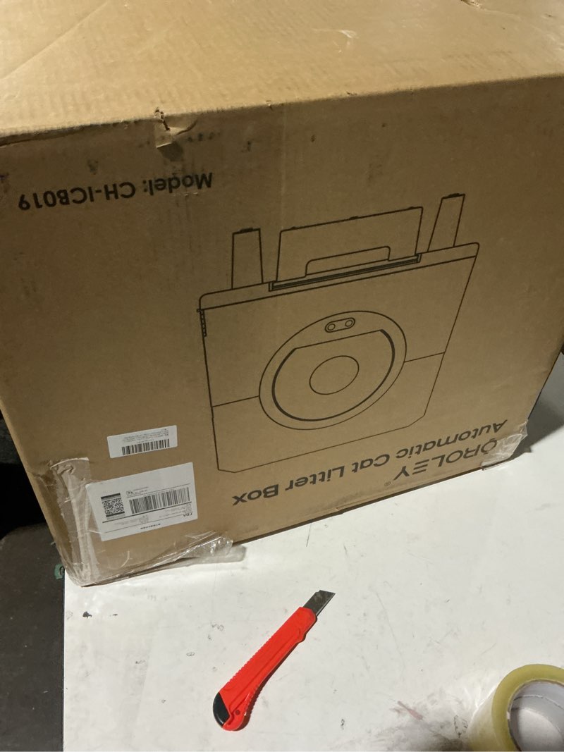 Condition photo showing New/Like New for oroley self cleaning litter box, large capacity automatic cat litter box with app control, safety sensors, built-in deodorizing scent box, and 1 roll garbage bags ?white off-white