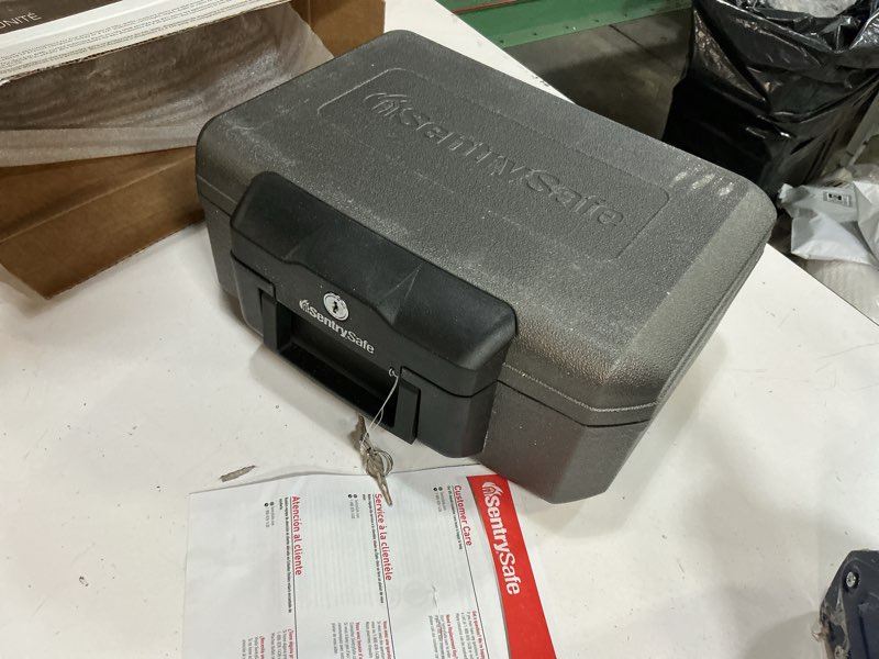 Condition photo showing As Is for sentrysafe 1210 small fire chest