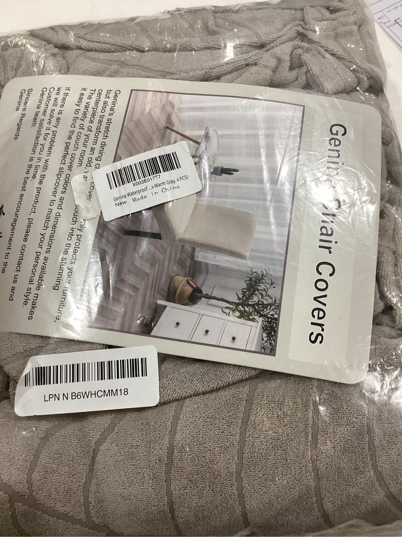 Condition photo showing New/Like New for genina 100% waterproof chair covers for dining room set of 4, stretch parson chair slipcovers for kitchen chairs, washable chair protectors, leaves-warm gray leaves-warm gray 4 pcs
