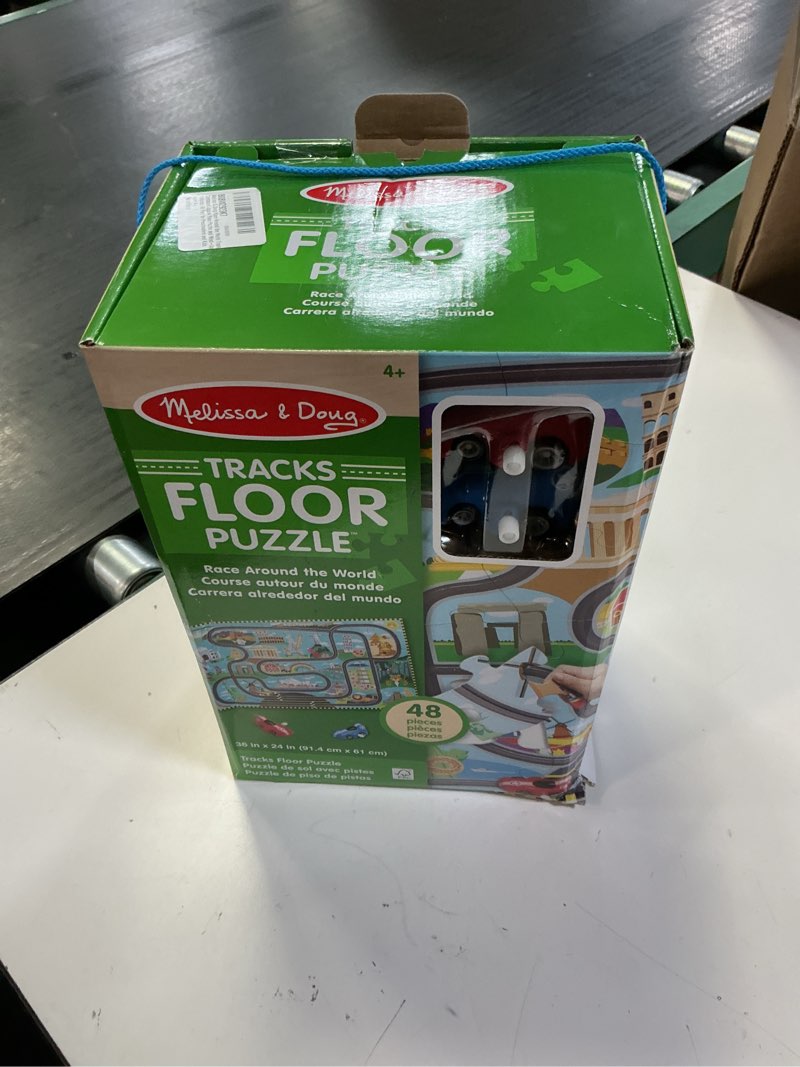 Condition photo showing New/Like New for melissa & doug race around the world tracks cardboard jigsaw floor puzzle and wind-up vehicles (48 pcs) for preschoolers and kids ages 4+ - fsc certified
