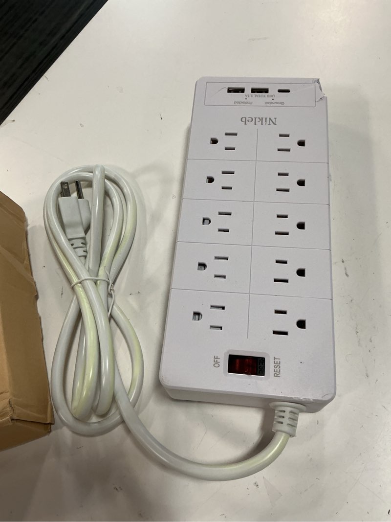 Condition photo showing As Is for power strip surge protector 23 in 1, 6ft extension cord with 3 usb ports smart 3.1a, multiple outlet adapter 20 outlets, outlet extender cord organizer for office, college, apartment, gaming stuff white power strip surge protector