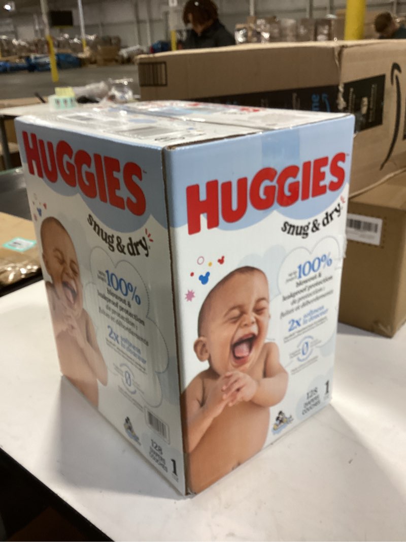Condition photo showing New/Like New for Huggies Snug & Dry Baby Diapers Unscented, Size 1 (8-14 lbs) - 128.0 ea