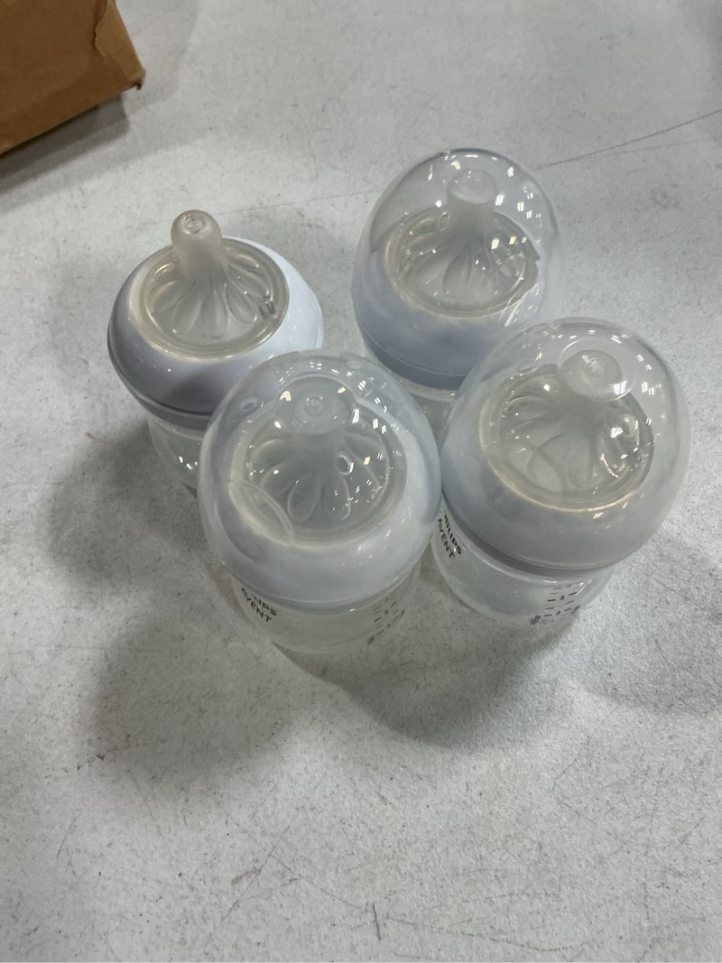Condition photo showing As Is for philips avent natural baby bottles with natural response nipples (slow flow, flow 2), 4oz, 4-pack, scy900/04 clear 4 count (pack of 1) natural 4oz