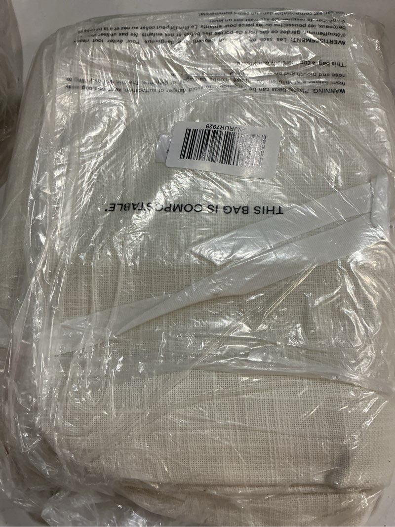 Condition photo showing New/Like New for textured cotton true blackout curtain, 48x84, ivory