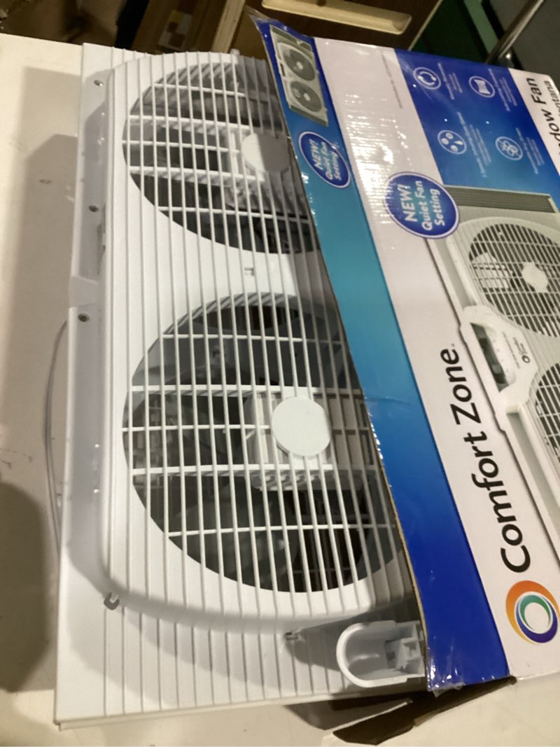 Condition photo showing Good Condition for comfort zone 9  twin window fan with quiet setting  reversible airflow control  3-speeds  expandable  exhaust  dual fan  airflow 9.84 ft/sec  ideal for home  kitchen  bedroom & office  cz319wt2