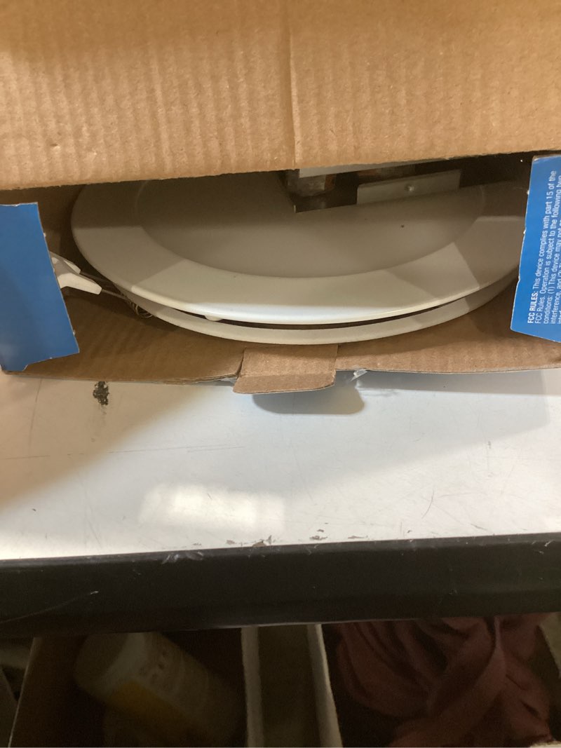 Condition photo showing As Is for utilitech white 6-in 850 -lumens switchable white round dimmable led canless wet rated recessed downlight