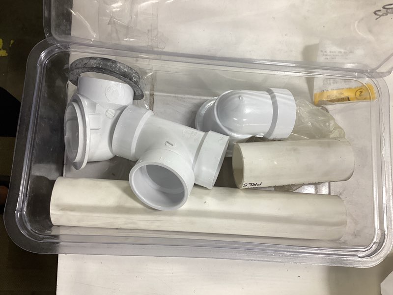 Condition photo showing As Is for keeney 1-1/2-in polished chrome white/polished chrome roller ball drain with pvc pipe