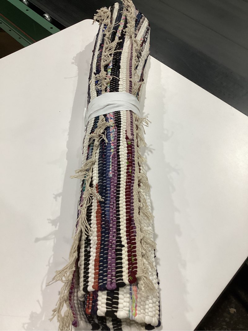 Condition photo showing Good Condition for COTTON CRAFT Cotton Chindi Rag Rug - Boho Farmhouse Rustic Area Accent Throw Rug - Handwoven Reversible Natural Recycled Yarn Carpet - Living Room Kitchen Entrance Home Gift - 20 x 32 in - Multi Color 1'8\" x 2'8\" (Rectangular) Multi Color - 1 Pack, SIMILAR TO STOCK PHOTO 