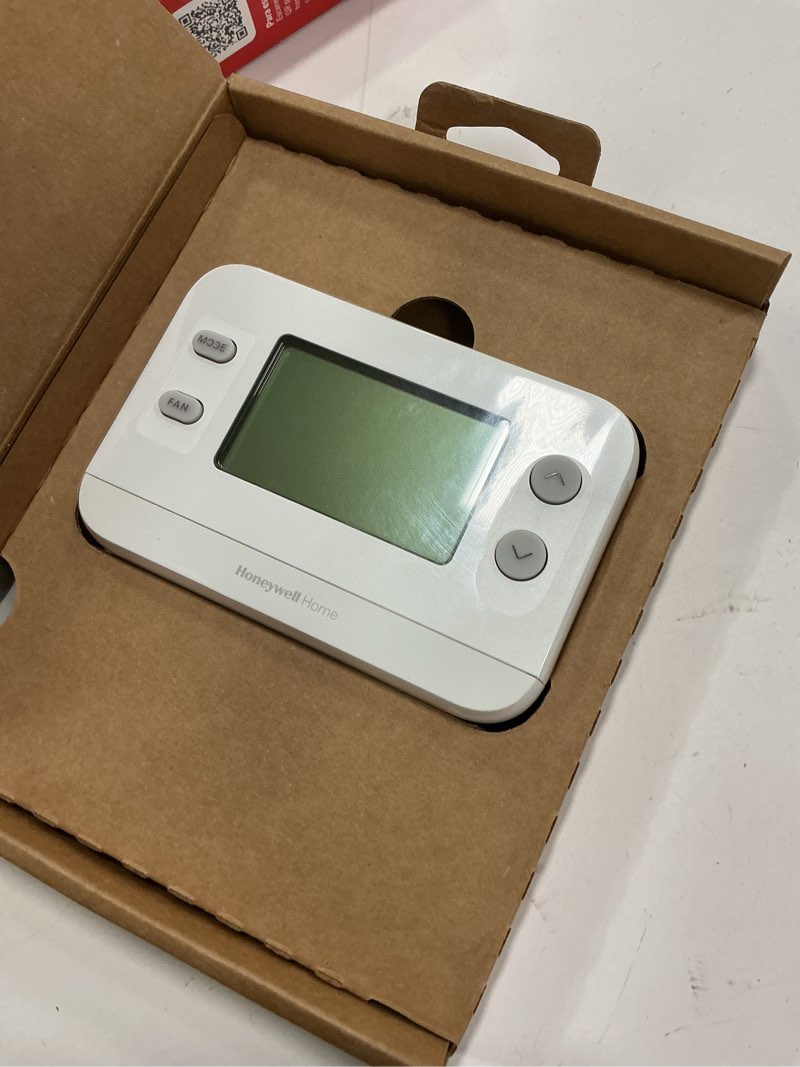 Condition photo showing Good Condition for New! Honeywell Home Non-Programmable Thermostat, Single-Stage, 1 Heat/1 Cool Compatibility, X1N, White