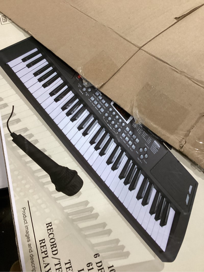 Condition photo showing Good Condition for Plixio 61-Key Digital Electric Piano Keyboard & Sheet Music Stand - Portable Electronic Keyboard for Beginners (Kids & Adults)