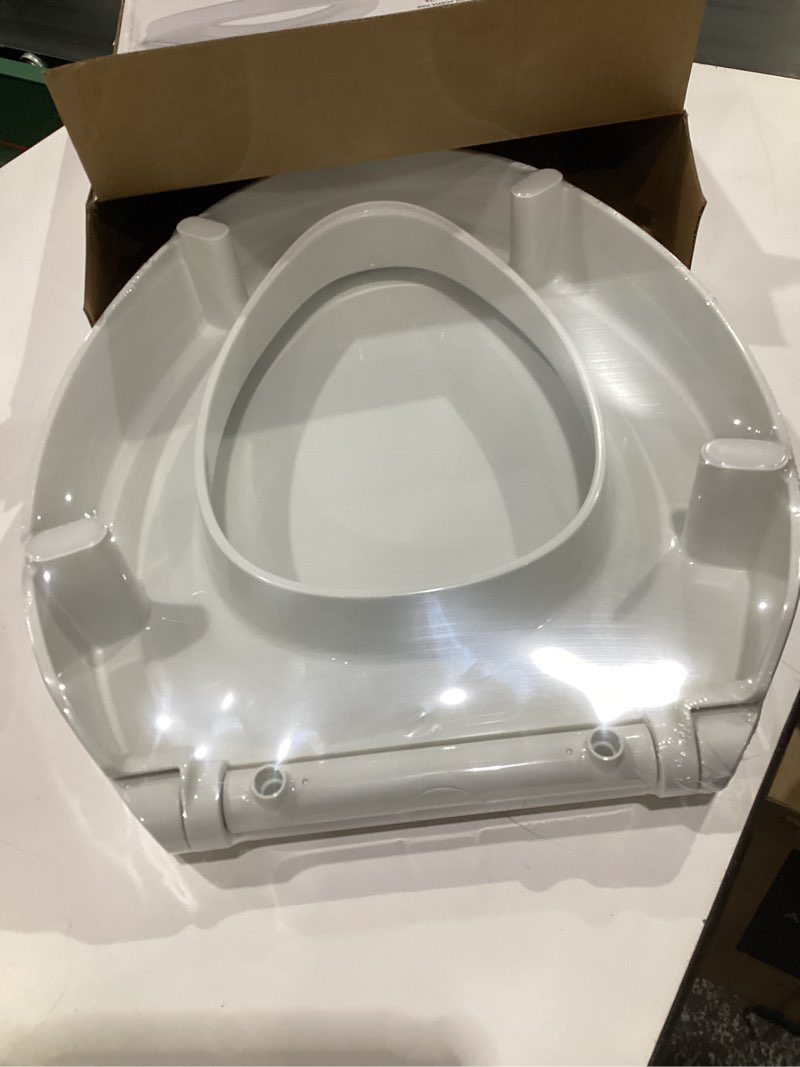 Condition photo showing Good Condition for KOHLER 25875-0 Hyten 3" Height, Elevated Soft Close Elongated Toilet Seat, Contoured Seat with Grip-Tight Bumpers, Quick-Attach Hardware, No Slam Toilet Seat, White White Elongated