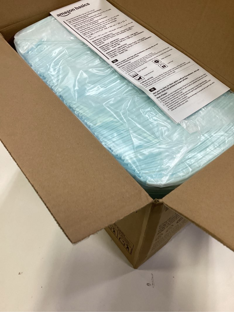 Condition photo showing New/Like New for Amazon Basics Dog and Puppy Pee Pads, 5-Layer Leak-Proof Super Absorbent, Quick-Dry Surface, Potty Training, Regular (22x22"), 100 Count, Blue & White Regular (100 Count)