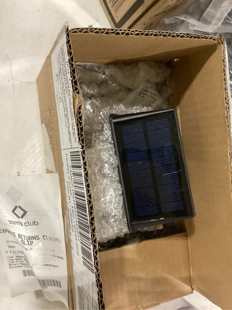 Condition photo showing As Is for solar deck lights