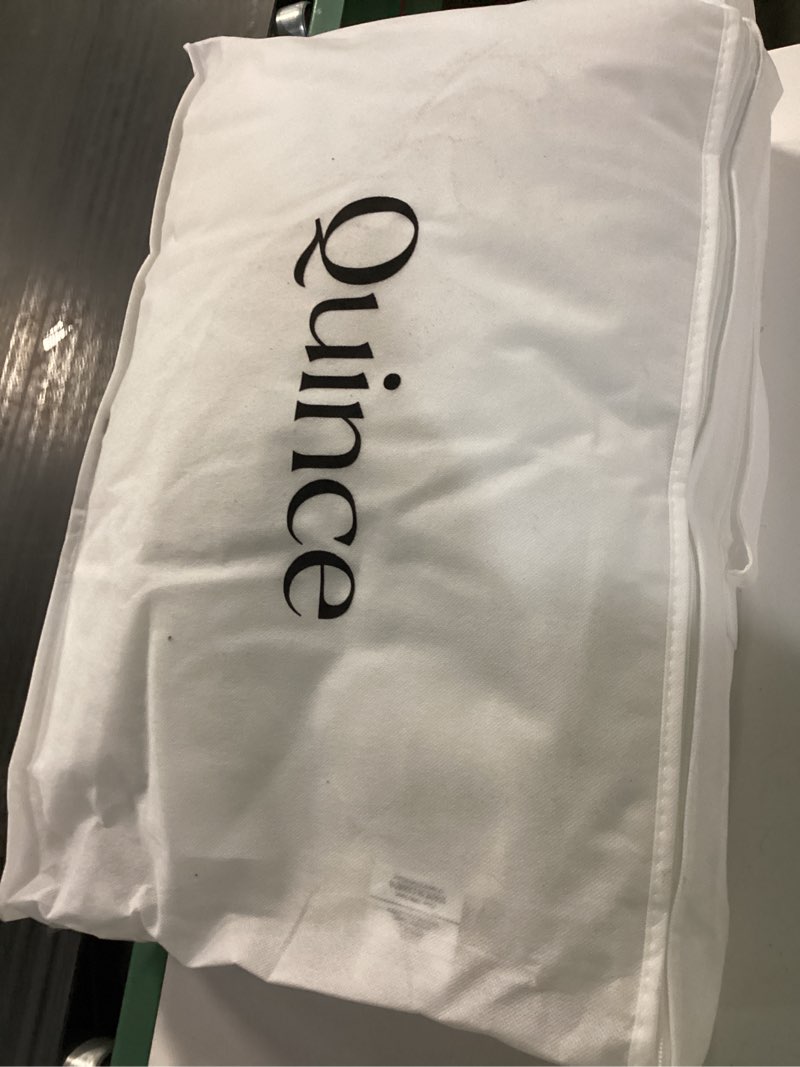 Condition photo showing New/Like New for premium down pillow, standard, medium