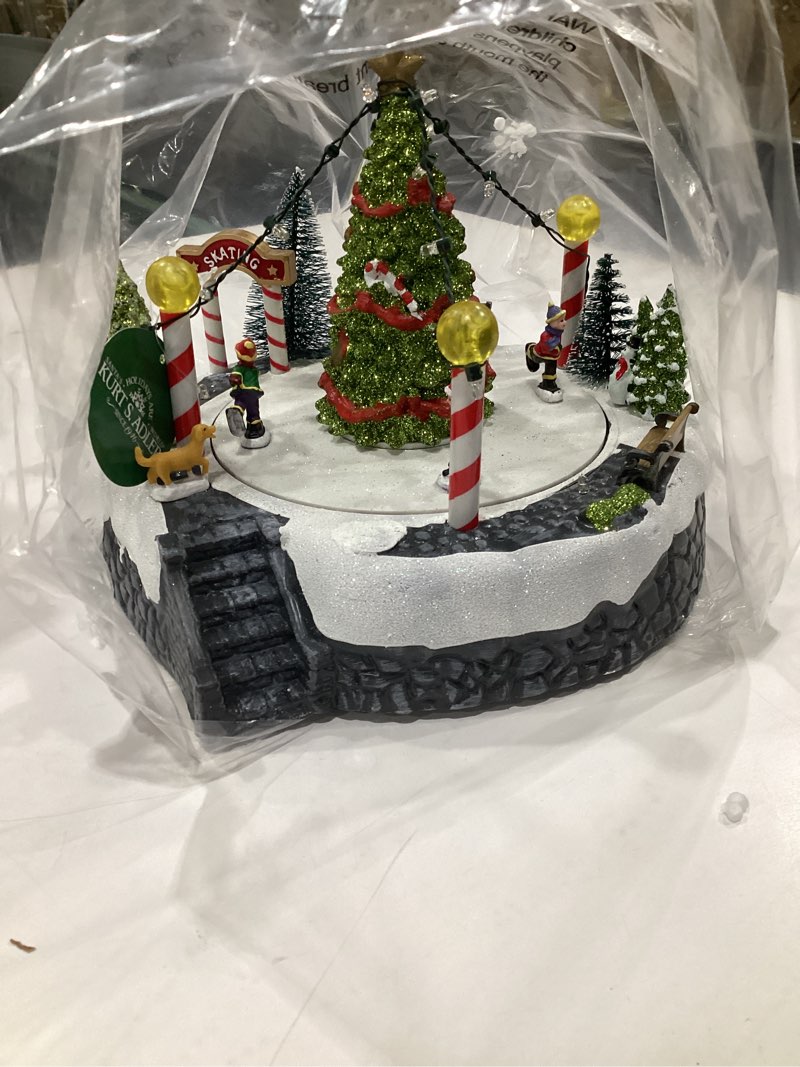 Condition photo showing Good Condition for Kurt S. Adler 7-Inch Battery-Operated Musical LED Ice Rink with Tree Table Piece