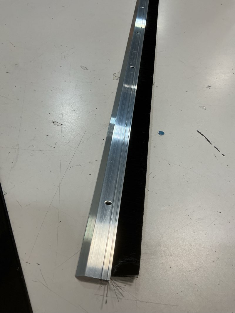 Condition photo showing Good Condition for aluminum & brush door sweep | 36-inch length | weatherproofing solution for gaps up to 1 1/2" | durable usa-made door sweep seal | dust, debris, and draft protection (36")