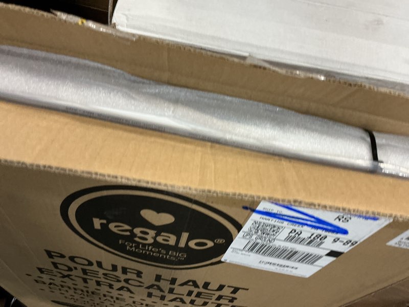 Condition photo showing New/Like New for regalo 2-in-1 extra tall easy swing stairway and hallway walk through baby gate, white, 24" - 40.5" wide white 24-40.5"w x 36"h