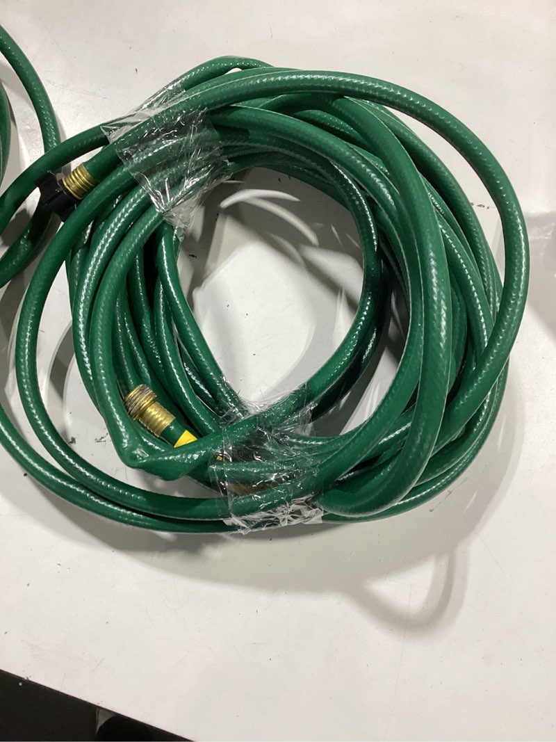 Condition photo showing As Is for vinyl green hose