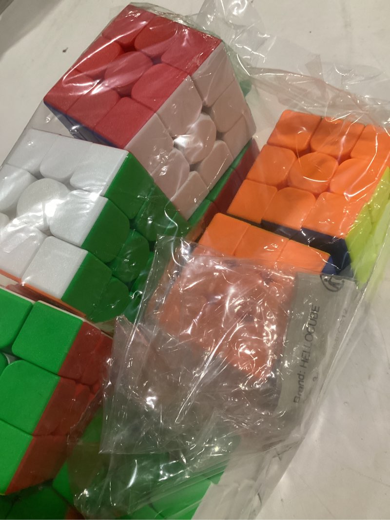 Condition photo showing New/Like New for 12 pack 3x3 speed cube set, stickerless magic cube bulk for kids party favors, classroom rewards & school prizes, sensory stress relief fidget toys