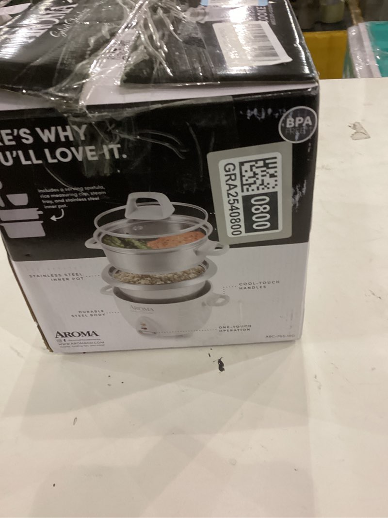 Condition photo showing As Is for Aroma Housewares 6-Cup (Cooked yield ) / 1.2Qt. Select Stainless Pot-Style Rice Cooker, & Food Steamer, One-Touch Operation, White