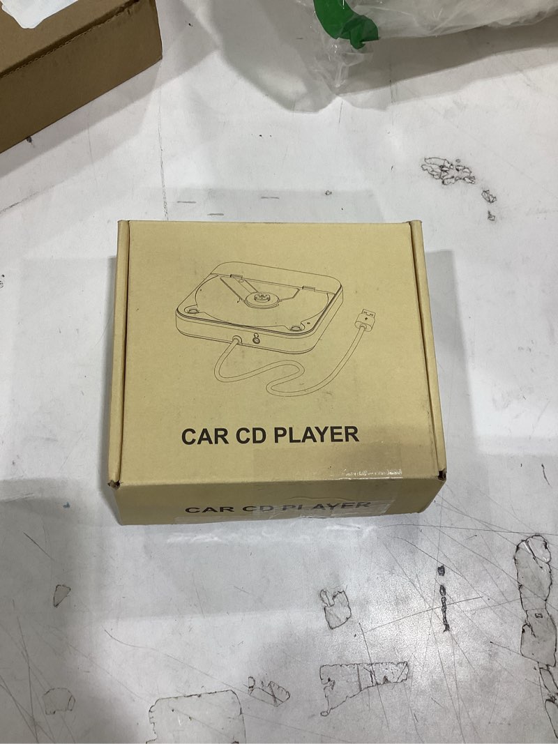 Condition photo showing Good Condition for this item is a portable external car cd player, likely model kc-606.  