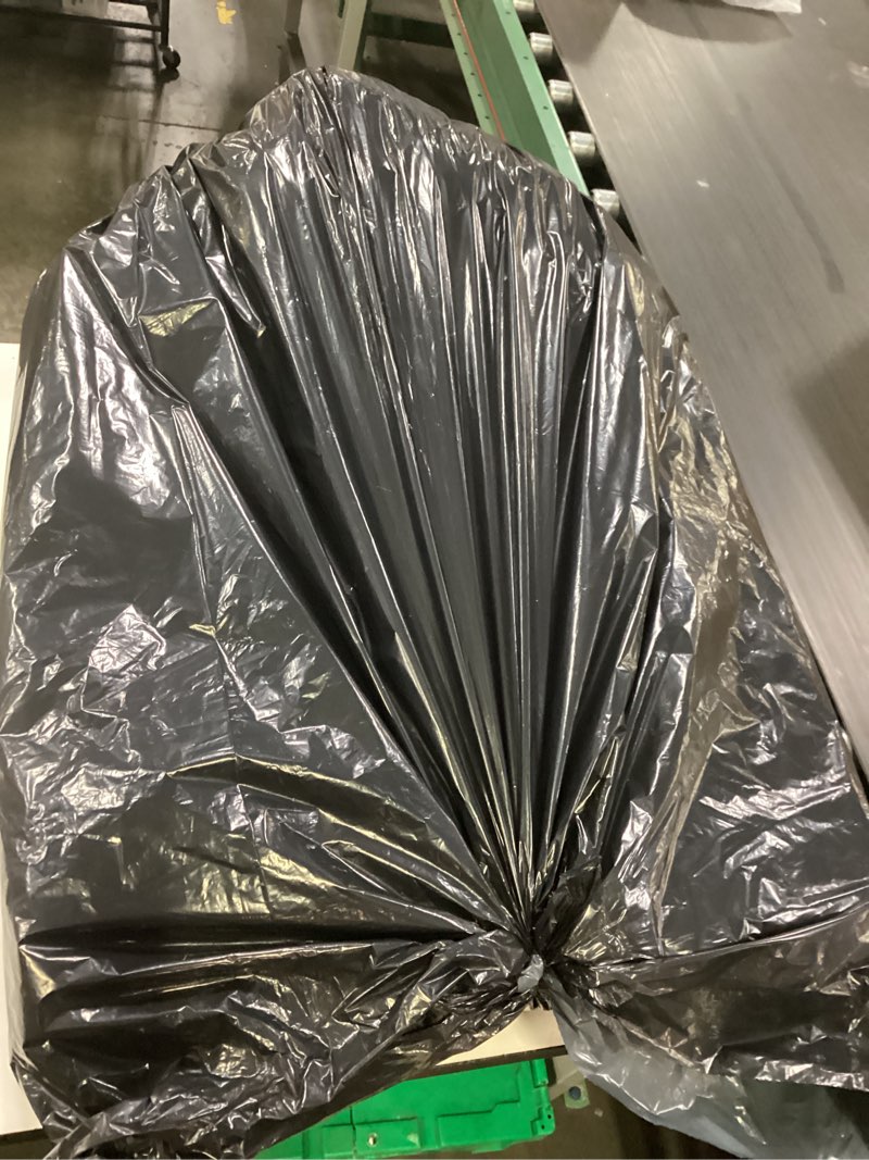 Condition photo showing As Is for black cushion with gray pillow