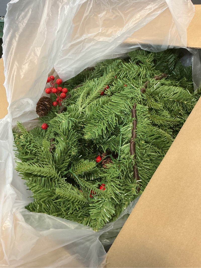 Condition photo showing As Is for christmas garland, 9ft pre-lit christmas garland with lights, battery operated with pine cones & red berries, artificial christmas greenery for mantle, staircase, doorway, indoor outdoor decorations 9ft green