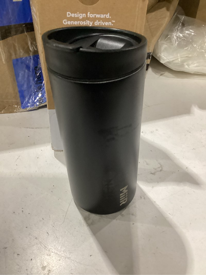 Condition photo showing New/Like New for miir tumbler, 16oz insulated stainless steel with press fit slide lid – splash proof design, holds hot & cold beverages, stylish & functional cup holder compatible