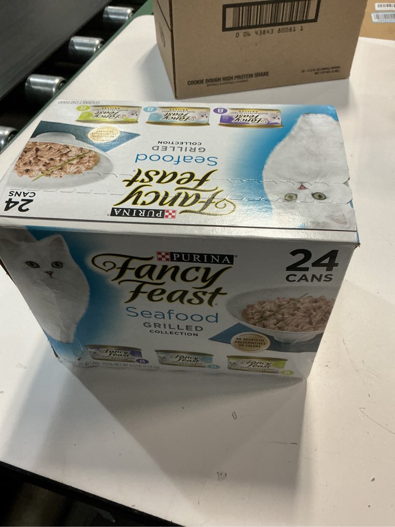 Condition photo showing New/Like New for ((bb:may/2027))purina fancy feast grilled wet cat food seafood collection in wet cat food variety pack - (pack of 24) 3 oz. cans