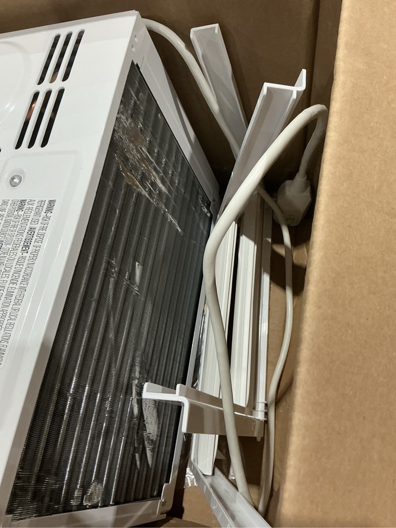 Condition photo showing Good Condition for amazon basics 5000-btu small window air conditioner, up to 150 sqf, window ac units with cool and fan functions, washable filter, adjustable window kit, intuitive mechanical controls, white white 5000 btu