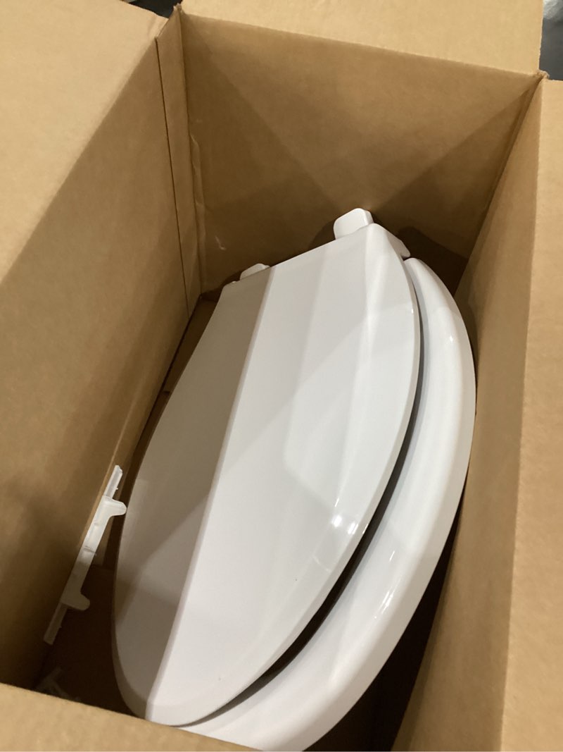 Condition photo showing As Is for KOHLER 4636-RL-0 Cachet ReadyLatch Elongated Toilet Seat Slow Close, Soft Close Toilet Seat Quiet Lid, Contoured Grip-Tight Bumpers Installation Hardware, Apartment Essentials, White White Elongated Ready Latch
