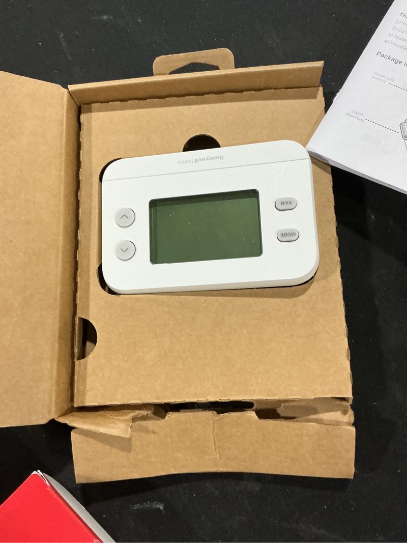 Condition photo showing As Is for New! Honeywell Home Non-Programmable Thermostat, Single-Stage, 1 Heat/1 Cool Compatibility, X1N, White