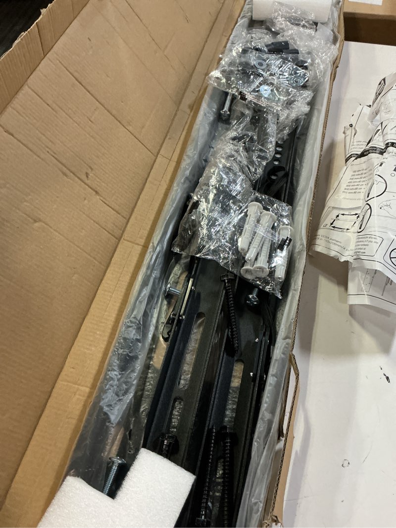 Condition photo showing As Is for ( similar ) tv wall mount with horizontal post installation leveling for 32 to 86 inch tvs, black fixed