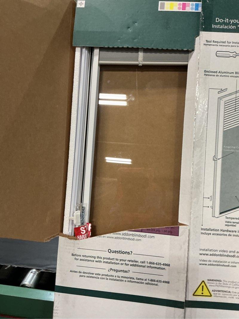 Condition photo showing Good Condition for 22 in. w x 64 in. h add-on enclosed aluminum blinds white steel & fiberglass doors with raised frame around glass