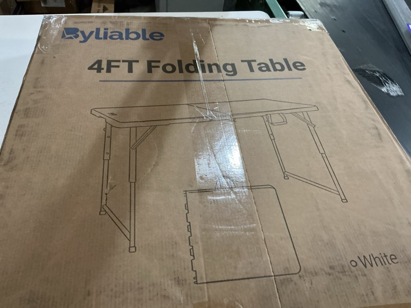 Condition photo showing New/Like New for byliable folding table 4 foot portable heavy duty plastic fold-in-half utility table small indoor outdoor adjustable height folding with carrying handle, camping and party,white | portable, heavy duty, fold-in-half, indoor outdoor, adjustable height, folding white 4ft