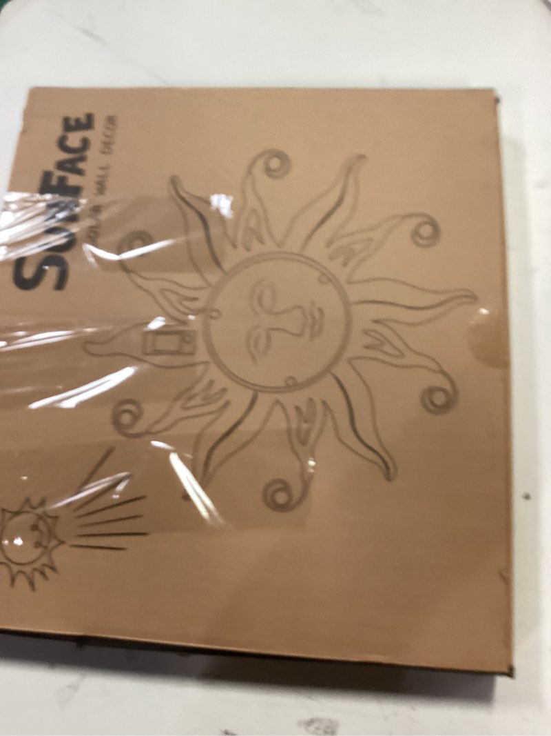 Condition photo showing New/Like New for Goodeco Solar Sun Face Wall Art – Metal Outdoor Wall Decor with Solar LED Lights for Garden & Patio - Weather Resistant, Smiling Sun Face Design (18 inch, Blue)