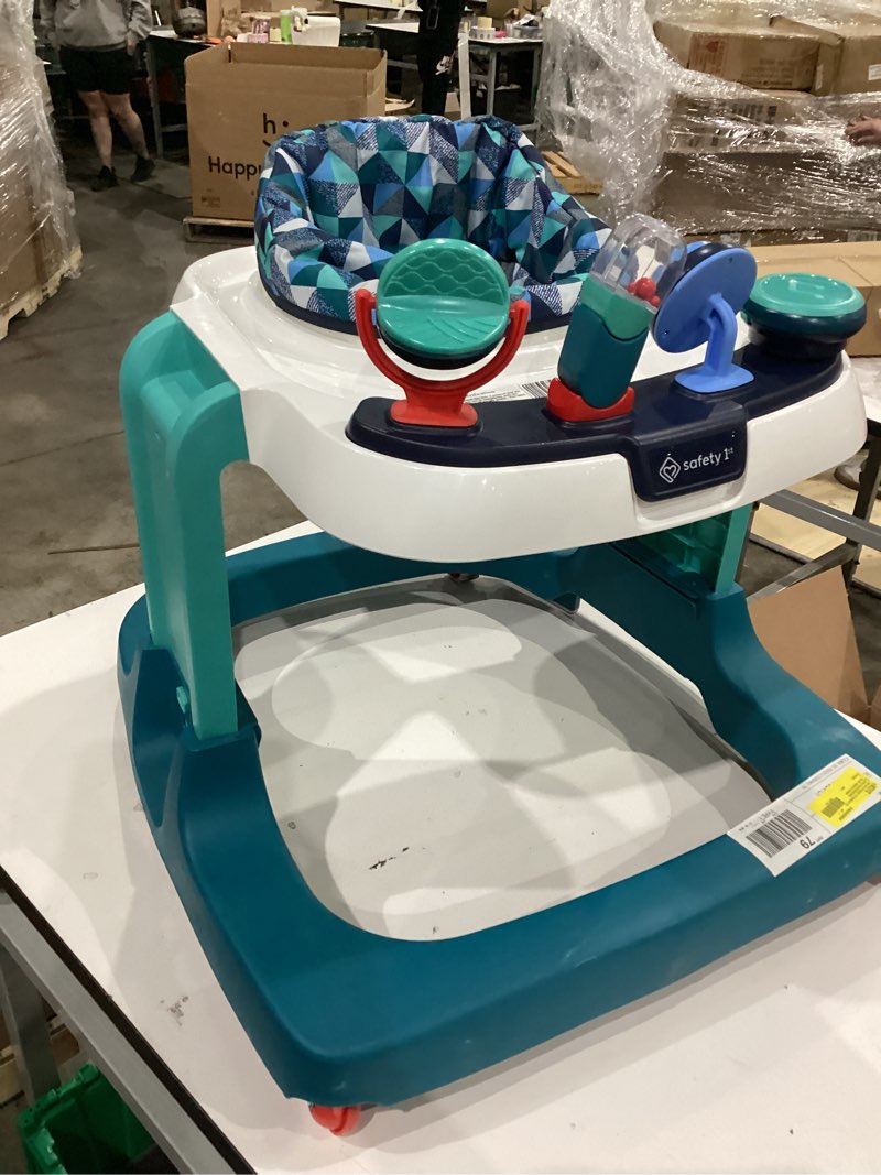 Condition photo showing As Is for safety 1st ready, set, walk! dx developmental walker