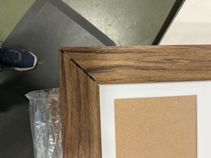 Condition photo showing As Is for 20”x20” brown picture frame with 9 photo slots (similar to stock photo)