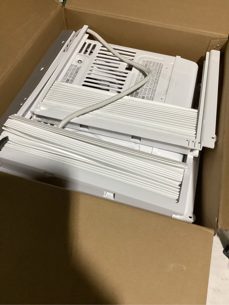 Condition photo showing Good Condition for amazon basics 6000-btu window air conditioner with quiet operation, up to 250 sqf, cool and fan functions, washable filter, adjustable window kit, digital temperature display, remote control, white white 6,000 btu