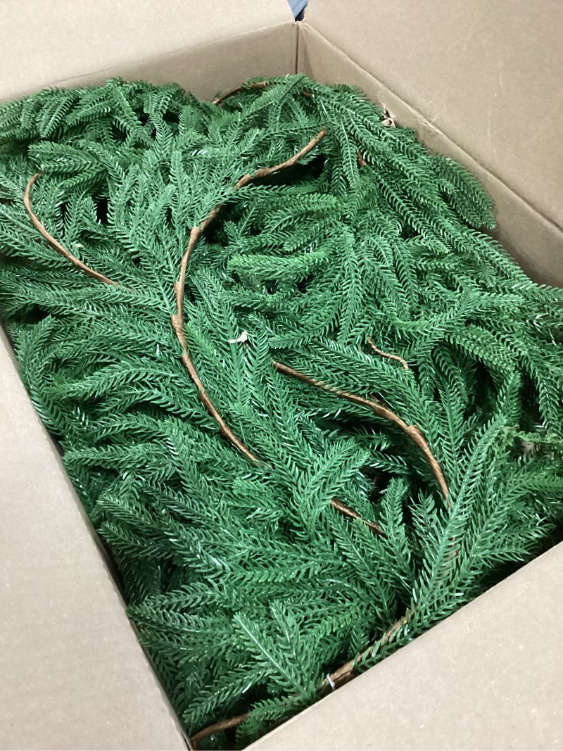 Condition photo showing Good Condition for 2 PCS-9FT Artificial Norfolk Pine Garlands - Real Touch Winter Pine Garland, Green Artificial Greenery Garland for Table, Mantle, Wall, Indoor, Outdoor Christmas Decorations 9ft-2 Pcs