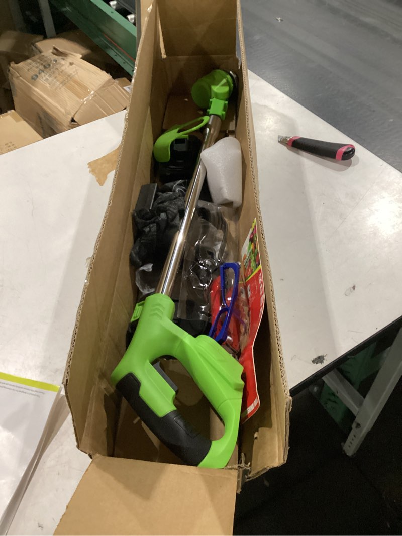 Condition photo showing New/Like New for electric lawn mower 