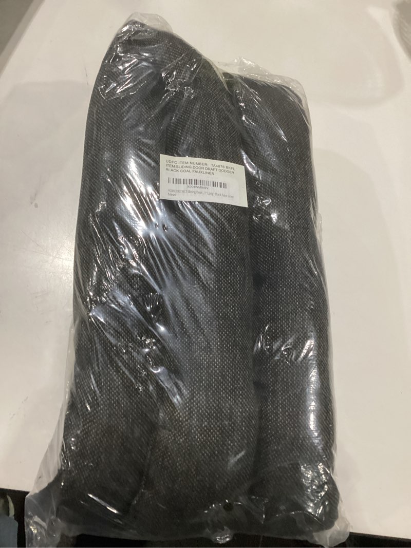 Condition photo showing New/Like New for home district sliding door draft stopper - glass door draft blocker, patio under door draft stopper, door air blocker draft dodger approx. 71" long - black faux linen