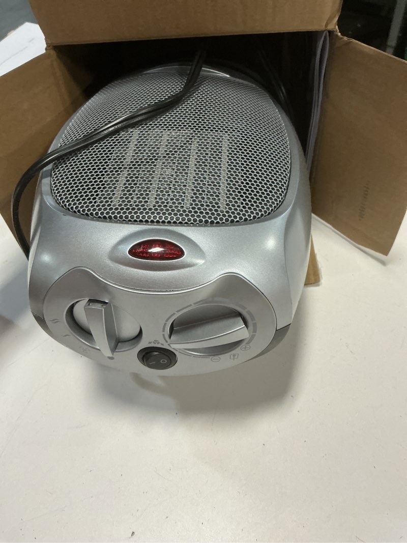 Condition photo showing Good Condition for Amazon Basics Oscillating Ceramic Space Heater, Portable Indoor Heating Solution, With Overheat and Tip-Over Protection, Thermostat, 1500W, 7.52"D x 6.34"W x 9.45"H, Silver