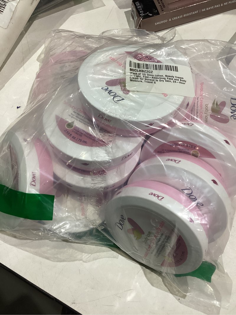 Condition photo showing Good Condition for Dove Lotion, Beauty Cream - Light, Fast-Absorbing Face and Body Cream for Normal to Dry Skin, 24-Hour Moisture, Travel Size, 2.53 Fl Oz. (Pack of 12) Unscented 2.53 Ounce (Pack of 12)