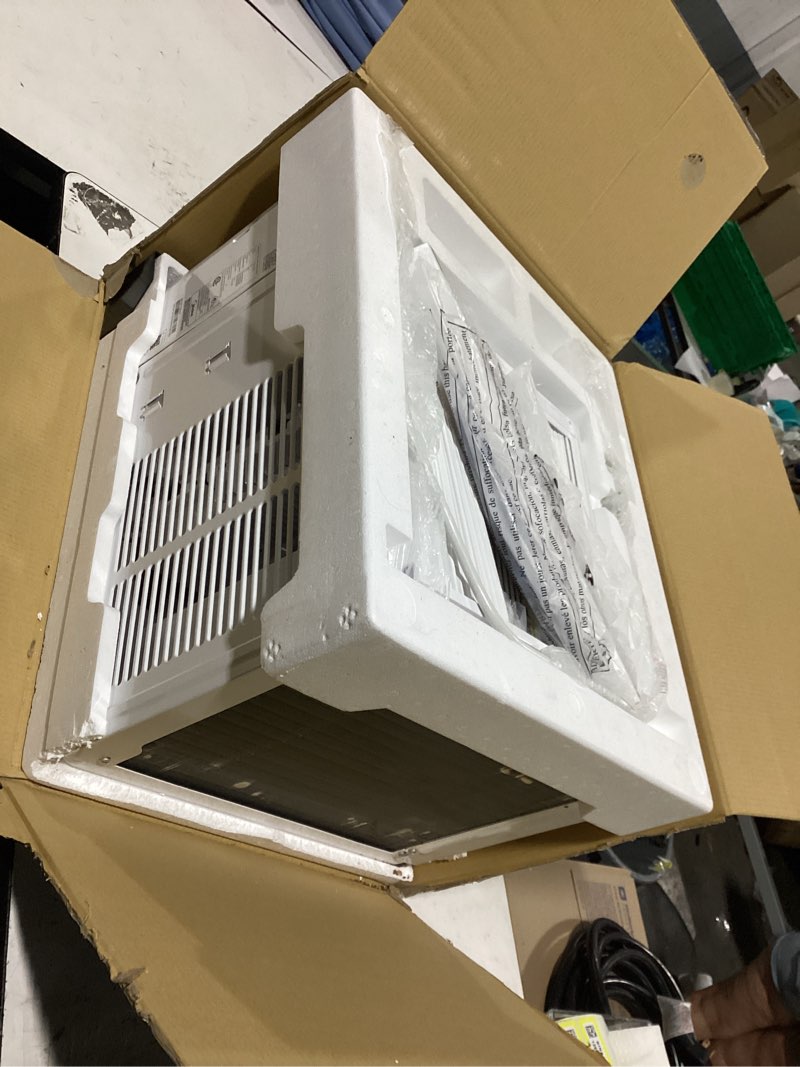 Condition photo showing As Is for midea 12,000 btu remote, cool only inverter window,new energy star, white,smart air conditioner