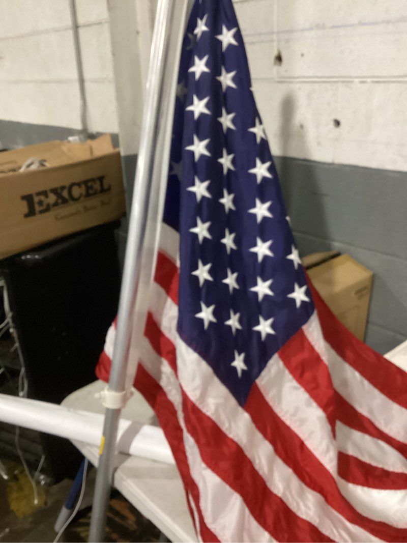 Condition photo showing As Is for american flag with pole