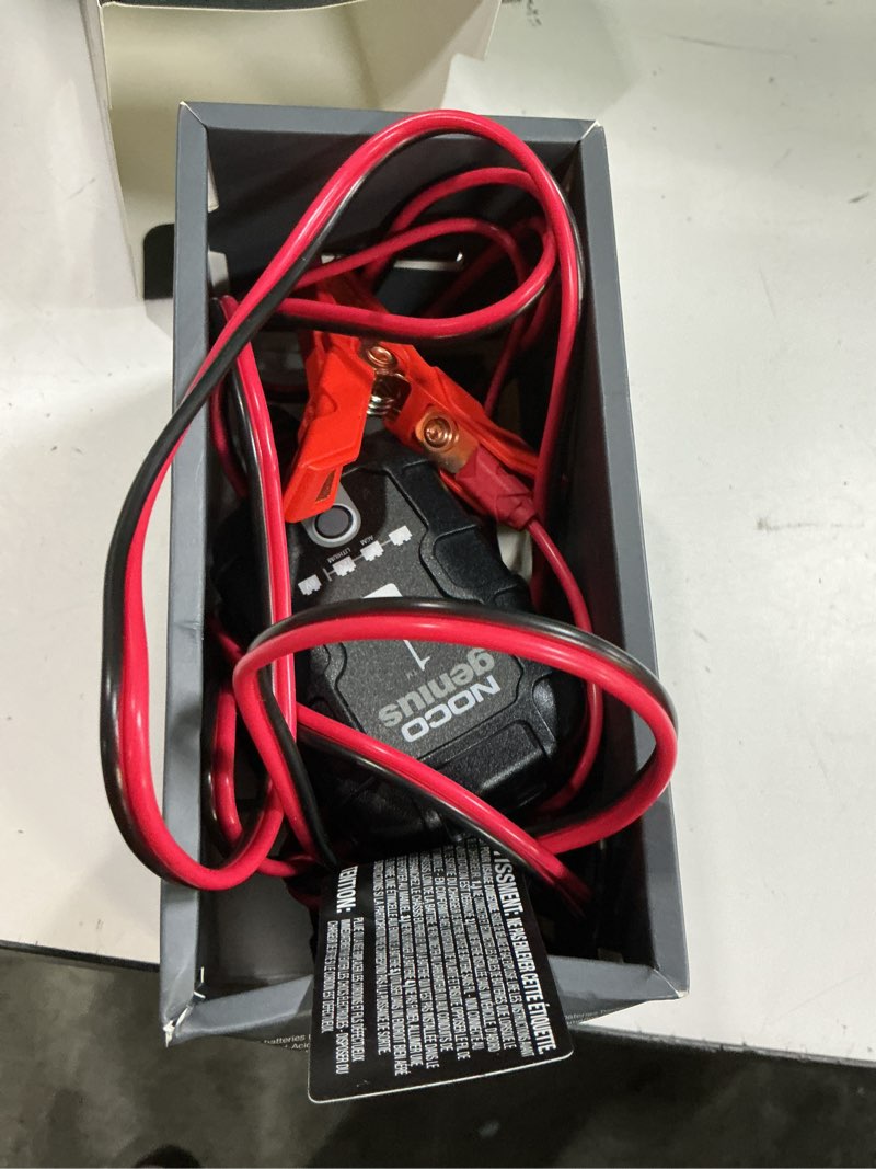 Condition photo showing As Is for noco genius1: 1a 6v/12v smart battery charger – automatic maintainer, trickle charger & desulfator with overcharge protection & temperature compensation – for lead-acid & lithium batteries