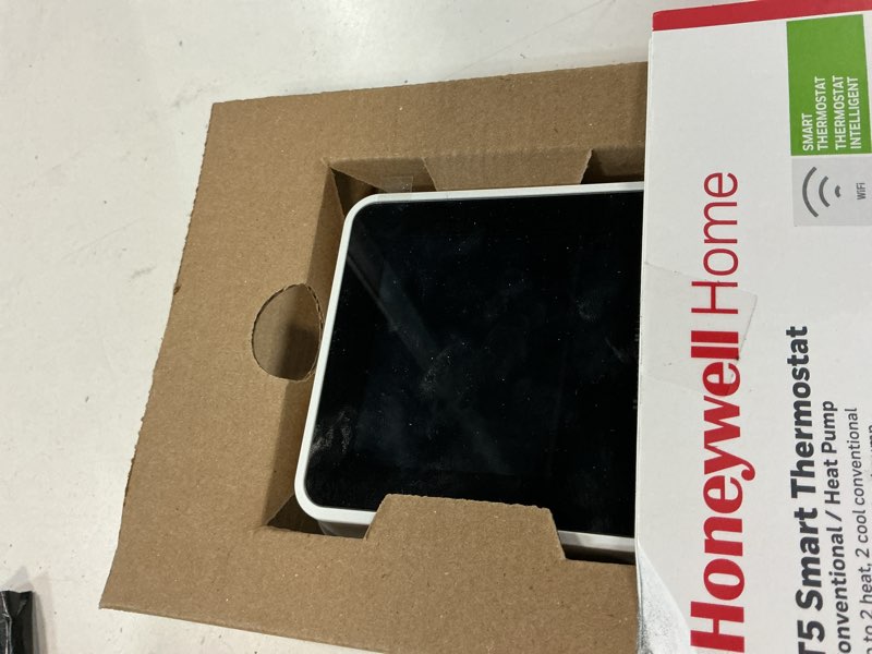 Condition photo showing As Is for t5 7-day smart wi-fi programmable thermostat with geofence technology