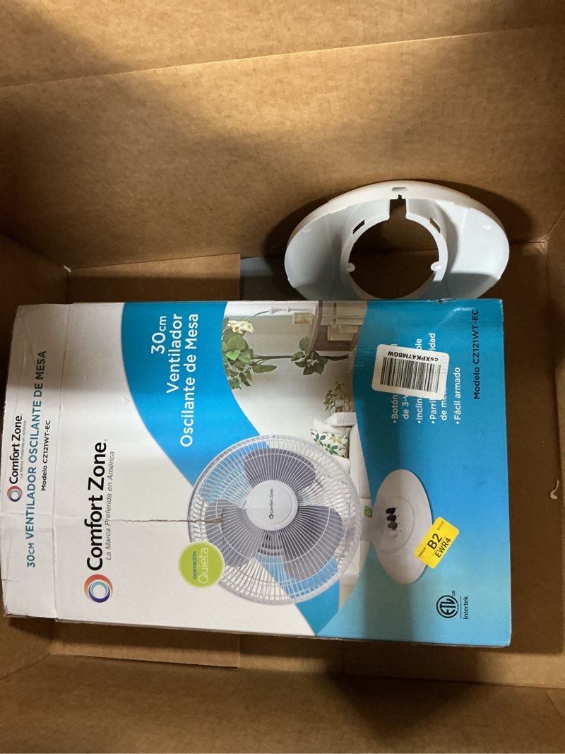 Condition photo showing As Is for comfort zone oscillating table fan with adjustable tilt, convenient push button controls, quiet, 12 inch, 3 speed, desk fan, airflow 7.25 ft/sec, ideal for home, bedroom, dorm & office, cz121wt white
